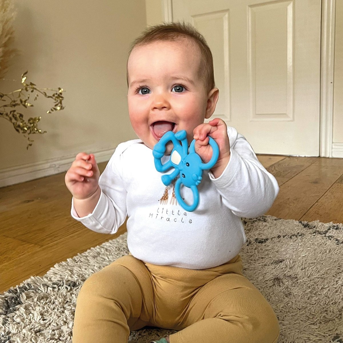 Nuby Yogi Teether - mezetto ebebek ebebek