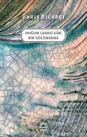 Doğum Lekesi Gibi Bir Gülümseme - İletişim Yayınları Kitap